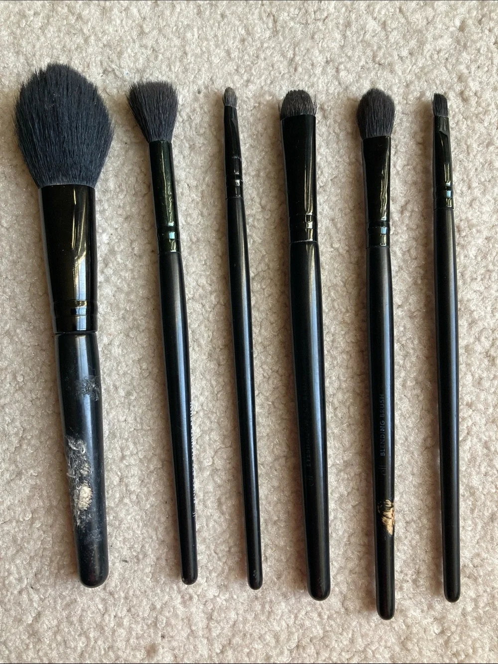 Assorted set of used 11 makeup brushes including Sephora, sonia kashuk and elf